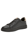 Zapatilla negra de cuero para mujer, estilo casual, ideal para actividades diarias.