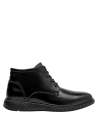 Botín negro para hombre, acabado en cuero, ideal para mantener la ventilación y el bienestar durante el uso.