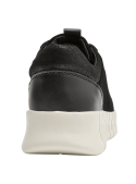 Zapatilla casual negra para mujer, diseño anatómico y flexible.