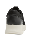 Zapatilla casual negra para mujer, diseño anatómico y flexible.