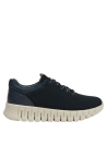 Zapatilla de cuña azul para mujer, estilo casual, ideal para actividades urbanas.