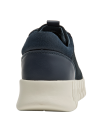 Zapatilla de cuña azul para mujer, estilo casual, ideal para actividades urbanas.