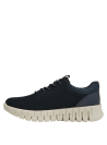 Zapatilla de cuña azul para mujer, estilo casual, ideal para actividades urbanas.