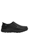 mocasín negro hombre casual de punta redonda, estilo versátil para jeans o pantalones.