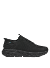 Zapatillas casuales negras, género hombre, tacón plano de 4 cm, comodidad en cada paso.