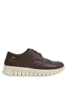 mujer zapatos en cuero suave color moro estilo chic perfectos para looks urbanos y casuales