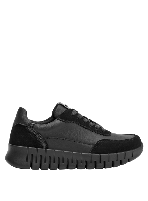 Zapatilla cuña negra de cuero para mujer, con plataforma, combina con jeans o vestidos relajados.