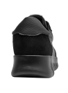 Zapatilla cuña de cuero negro para mujer, diseño anatómico, perfecta para actividades cotidianas.