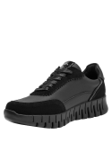 Zapatilla cuña negra de cuero para mujer, estilo casual, ideal para uso diario.