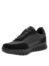 Zapatilla cuña negra de cuero para mujer, estilo casual, ideal para uso diario.