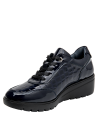 Zapato de cuña azul para mujer, estilo formal, ideal para rutinas urbanas.