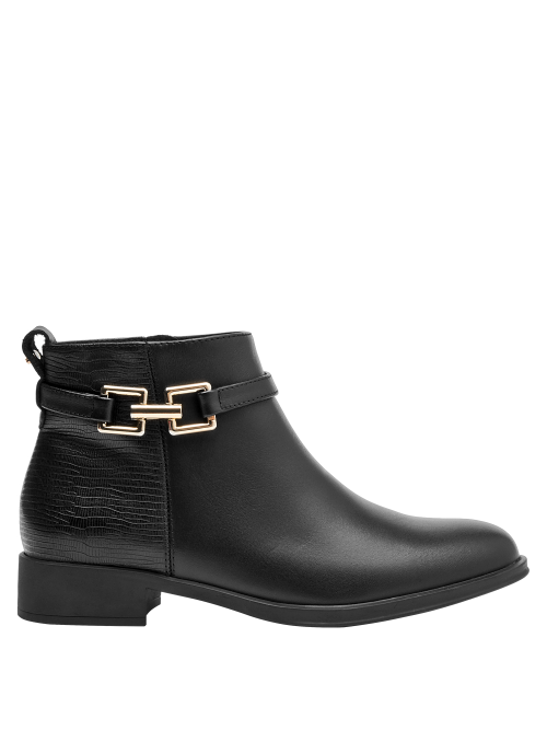 Botín negro de cuero con punta redonda, recomendado para un look fresco y moderno en actividades diarias.