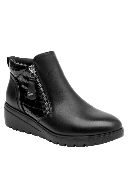 Botín de cuero negro para mujer, diseño anatómico, ideal para un look cómodo y moderno.