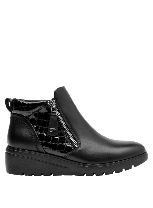 Botín de cuero negro para mujer, diseño anatómico, ideal para un look cómodo y moderno.