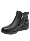 Botín negro de cuero para mujer, estilo casual, ideal para uso diario y elegante.