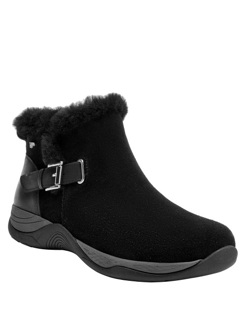 Botín negro de mujer, estilo casual chic, diseñado para libertad de movimiento.
