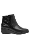 Botín negro de cuero para mujer, diseño elegante y cómodo, recomendado para jornadas largas.
