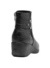 Botín negro para mujer, estilo casual, con acabado de textura suave, ideal para actividades diarias.