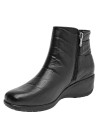 Botín negro de cuero para mujer, estilo casual, ideal para uso diario y comodidad prolongada.