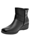 Botín de cuero negro para mujer, estilo casual, ideal para uso diario y comodidad.