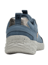 Zapatillas para mujer en color celeste, material textil, perfectas para un toque chic y relajado.
