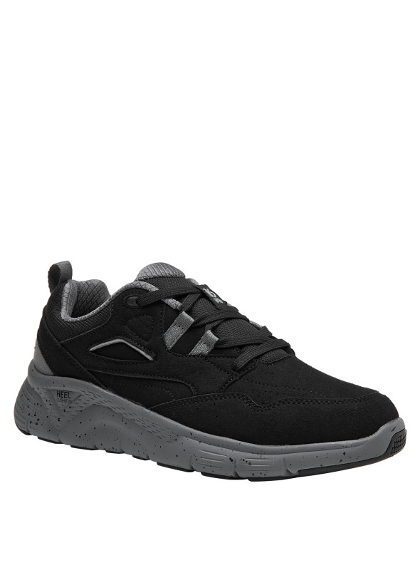Zapatillas de hombre en color negro, perfectas para combinar con jeans y camisetas casuales.