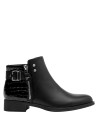 Botín negro de cuero para mujer, perfecto para actividades urbanas, combina confort y sofisticación.