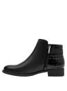 Botín negro de cuero para mujer, diseño anatómico, recomendado para comodidad y elegancia en el día a día.