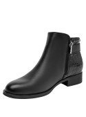 Botín negro de cuero con taco plano de 2.5 cm, estilo moderno para mujer, perfecto para combinar con jeans.