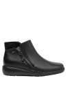 Botín negro de cuero para mujer, versátil y elegante, recomendado para rutinas diarias.