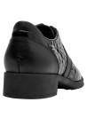 Calzado de cuero negro para mujer, ideal con blusa y pantalones.