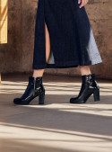 Botín negro de cuero mujer, estilo casual, ideal para uso diario y comodidad.
