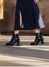 Botín negro de cuero mujer, estilo casual, ideal para uso diario y comodidad.