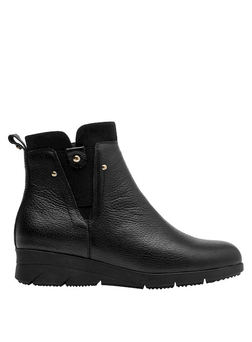 Calzado casual negro de mujer, botines de cuero que combinan confort y estilo en cada paso.
