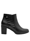 Calzado de cuero negro para mujer, texturas modernas, combina con jeans o faldas.
