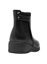 Calzado sintético negro para mujer, perfecto con jeans ajustados.