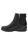 Calzado de cuña negro para mujer, recomendado para looks informales.