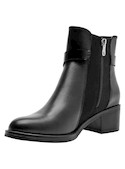 Botines de cuero negro para mujer, estilo casual, ideales para actividades urbanas.