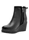 Botines de cuña negros para mujer, estilo casual, ideales para rutinas urbanas.
