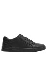 Zapatillas de cuero negro para hombre, diseño atemporal, recomendado para combinar con jeans y camisetas.