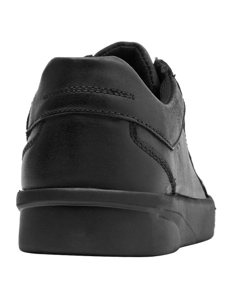 Zapatillas negras de cuero para hombre, estilo casual, ideales para uso diario y actividades laborales.