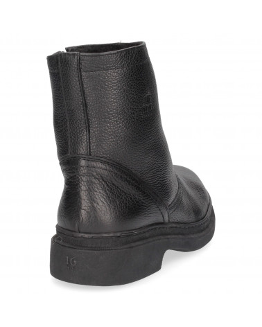 Calzado de cuero negro para hombre, suela gruesa y soporte en tobillo, perfecto para actividades urbanas y al aire libre.