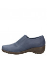 Calzado azul casual de cuero para mujer, diseño versátil con banda elástica y cierre lateral moderno.