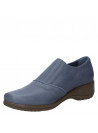 Zapato azul de cuero para mujer, estilo casual, con banda elástica sobre el empeine y cierre decorativo lateral.