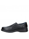 Mocasín negro de cuero para hombre, diseño atemporal con costuras decorativas, perfecto para eventos semi-formales.