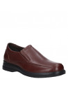 Mocasines de cuero marrón para hombre, elegantes y funcionales, ideales para trabajo y eventos sociales.