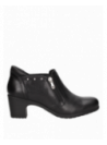 Botín negro de cuero para mujer, sofisticado y cómodo, con relieve reptil y cierre práctico, perfecto para el día a día.